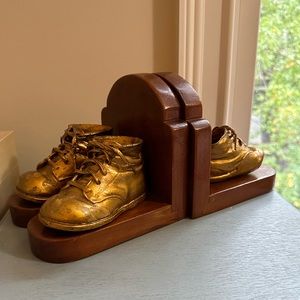 Set of vintage bookends with baby shoes